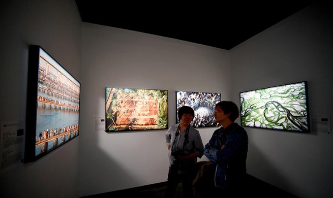 Int'l photo exhibition opens in central China