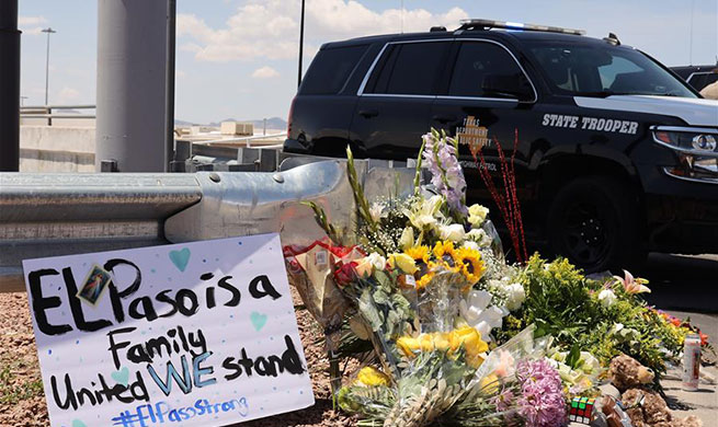 People mourn for mass shooting victims in Texas, Ohio