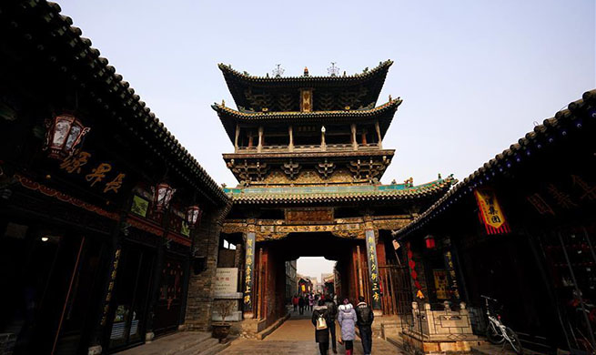 Tourists visit ancient city of Pingyao in N China's Shanxi