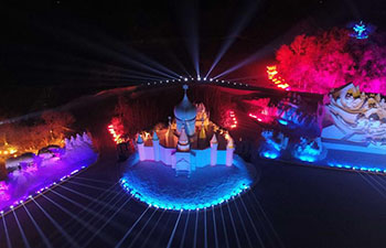 3D snow-light show held at Sun Island Int'l Snow Sculpture Art Expo