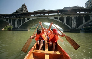 Various activities held across China to celebrate upcoming Dragon Boat Festival